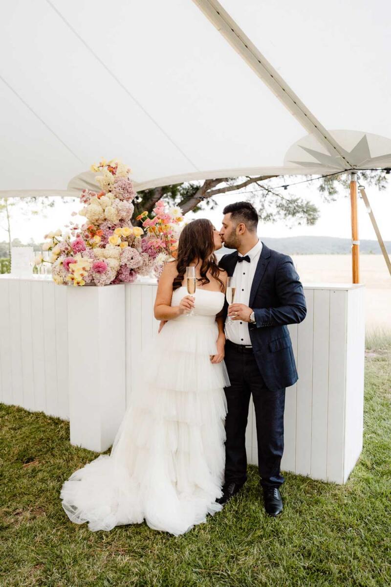 Dallah-chapel-wedding-couple-kiss-1000x1500-1
